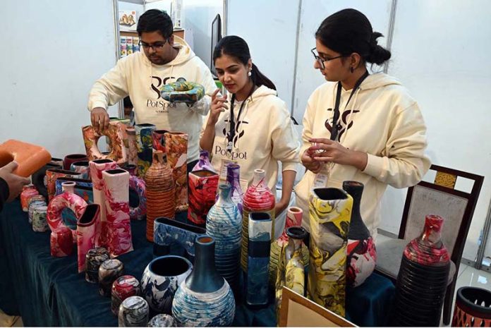 Visitors exploring stalls at IWCCI and APJCCI’s 7th Islamabad Expo 2025, celebrating innovation, business growth, and cultural exchange at the Pak-China Friendship Centre