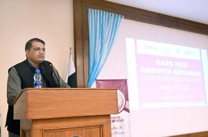 Sabeen Ghori, Parliamentary Secretary IT, presents a shield to Rana Imran Latif, Senior journalist, Anchorperson and chairman of Piyass International Human Rights, at the “Safe Her Growth” seminar at HITEC University Taxila.