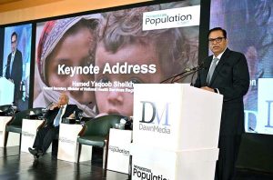 Senator Mushahid Hussain Syed addresses a conference on population issues organized by Dawn Media at a local hotel.