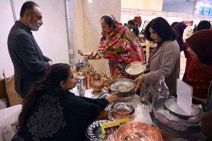 Visitors exploring stalls at IWCCI and APJCCI’s 7th Islamabad Expo 2025, celebrating innovation, business growth, and cultural exchange at the Pak-China Friendship Centre
