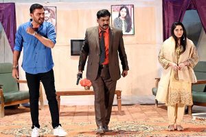 Artists performing in the drama “ Khali Botal (Empty Bottle)” during Drama Festival at Z.A. Bhutto Open Air Theater, Arts Council.