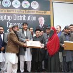 Federal Minister for Kashmir and Gilgit-Baltistan Affairs and SAFRON Engineer Amir Muqam is distributing laptops among the students of University of Malakand under the Prime Minister's Youth Laptop Scheme Phase-IV.