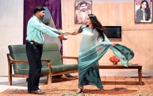 Artists performing in the drama “ Khali Botal (Empty Bottle)” during Drama Festival at Z.A. Bhutto Open Air Theater, Arts Council.