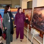 A visitor views a photo exhibition organized in collaboration with Government College Women University Faisalabad and Yunus Emre Enstitüsü, showcasing Turkish heritage at Punjab Art Council