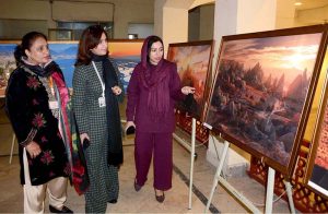 A visitor views a photo exhibition organized in collaboration with Government College Women University Faisalabad and Yunus Emre Enstitüsü, showcasing Turkish heritage at Punjab Art Council