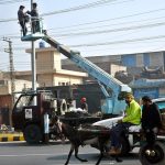 CBD Punjab electricians carefully repair a damaged high-voltage line on 47 Road, ensuring uninterrupted power supply in the area of the provincial capital.