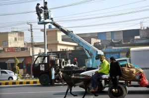 CBD Punjab electricians carefully repair a damaged high-voltage line on 47 Road, ensuring uninterrupted power supply in the area of the provincial capital.
