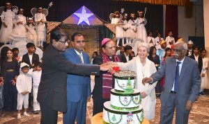Girls decorate a Christmas tree at St. Thomas Church in Civil Colony ahead of the upcoming Christmas celebrations.