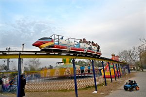 Weekend visitors enjoy a mini-train ride at Lake View Park in the federal capital.