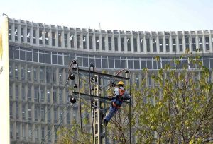 A WAPDA electrician carefully repairs a faulty high-voltage line at Zero Point, working tirelessly to ensure uninterrupted power of the area battling height and winter winds to restore electricity in the federal capital.