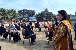 Chairperson Benazir Income Support Programme, Senator Rubina Khalid, addresses beneficiaries during her visit to the SIM Distribution Center at Vista.