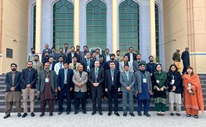 Vice Chancellor of Islamia University of Bahawalpur, Prof. Dr. Muhammad Kamran, presents a shield to Vice Chancellor Prof. Dr. Saeed Ahmed Buzdar during a two-day international conference on emerging trends in the field of physics.