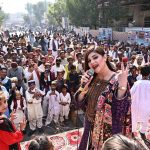 A folk singer performing Sindhi song during Sindhi culture day outside press club