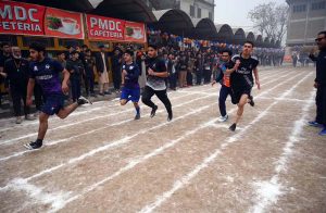 Students are participating in a sack race during the closing ceremony of Annual Sports Gala 2025 at PMDC Dalazak.