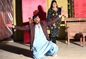 Artists perform in a stage drama “Ishq Faqeer” during the Drama Festival at Z.A. Bhutto Open Air Theatre, Arts Council.