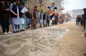 Students are participating in a sack race during the closing ceremony of Annual Sports Gala 2025 at PMDC Dalazak.