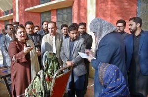 Chairperson Benazir Income Support Programme (BISP), Senator Rubina Khalid addressing the beneficiaries of BISP during her visit to the SIM Distribution Center at Vista Government Secondary School, Sheikhupura.