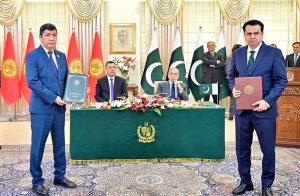 Pakistani Federal Minister exchange MoU with his Kyrgyz counterpart at the ceremony of exchange of MoUs between Pakistan and Kyrgyzstan in various sectors.