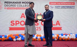 Students are participating in a sack race during the closing ceremony of Annual Sports Gala 2025 at PMDC Dalazak.