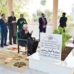 President Asif Ali Zardari offers Fateha on the grave of his father, Sardar Hakim Ali Zardari, at Baloo Ja Quba