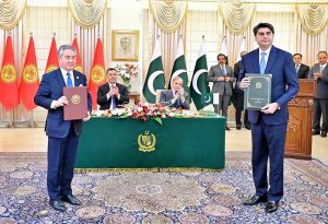 Pakistani Federal Minister exchange MoU with his Kyrgyz counterpart at the ceremony of exchange of MoUs between Pakistan and Kyrgyzstan in various sectors.