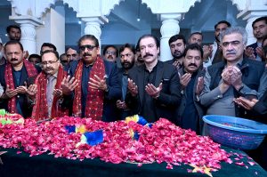Prime Minister of Azad Kashmir Raja Faisal Mumtaz Rathore offering Fateha on the grave of Shaheed Mohtarma Benazir Bhutto at Garhi Khuda Bakhsh.