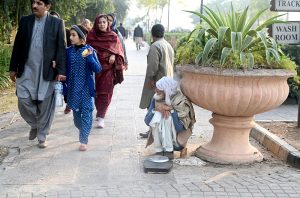 Weekend visitors enjoy a mini-train ride at Lake View Park in the federal capital.