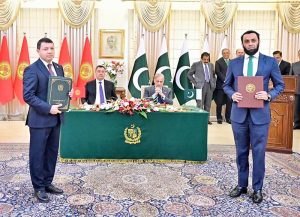 Pakistani Federal Minister exchange MoU with his Kyrgyz counterpart at the ceremony of exchange of MoUs between Pakistan and Kyrgyzstan in various sectors.