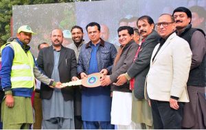 State Minister for Interior Senator Talal Chaudhary addresses the gathering after distributing motorbikes to Para-veterinary staff at the Civil Veterinary Hospital.