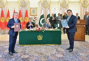 Pakistani Federal Minister exchange MoU with his Kyrgyz counterpart at the ceremony of exchange of MoUs between Pakistan and Kyrgyzstan in various sectors.