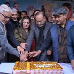 Defense Minister Khawaja Muhammad Asif and Mansha Ullah Butt, Minister for Labour and Human Resources Punjab, along with others, cut the Christmas cake during a ceremony organized by the PML-N Minority Wing