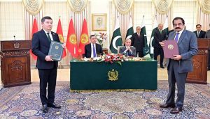 Pakistani Federal Minister exchange MoU with his Kyrgyz counterpart at the ceremony of exchange of MoUs between Pakistan and Kyrgyzstan in various sectors.