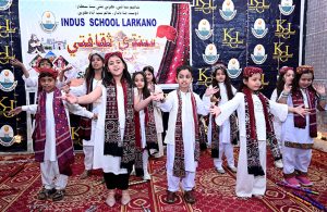 Students of Indus School Larkana performing tableau during Sindhi Culture Festival.
