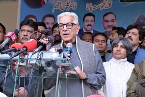 Defense Minister Khawaja Muhammad Asif and Mansha Ullah Butt, Minister for Labour and Human Resources Punjab, along with others, cut the Christmas cake during a ceremony organized by the PML-N Minority Wing