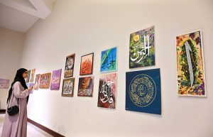 Art enthusiasts taking a keen interest in the calligraphy artworks on display at an exhibition showcasing the remarkable talent of students from PNCA’s ongoing Calligraphy Classes. The exhibition reflects their dedication, creativity, and artistic growth throughout the course.