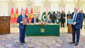 Pakistani Federal Minister exchange MoU with his Kyrgyz counterpart at the ceremony of exchange of MoUs between Pakistan and Kyrgyzstan in various sectors.