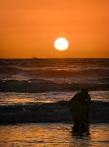As the last sunset of 2025 glows over Seaview Beach, residents pause between reflection and hope.