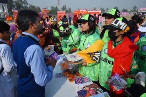 Female visitors explore various stalls during the 16 Days of Activism event at Hayatabad Sports Complex, highlighting unity, hope, and a collective commitment to end violence against women and girls
