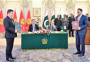 Pakistani Federal Minister exchange MoU with his Kyrgyz counterpart at the ceremony of exchange of MoUs between Pakistan and Kyrgyzstan in various sectors.