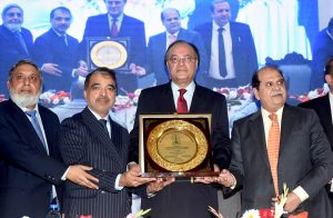 Federal Minister for Finance and Revenue Senator Muhammad Aurangzeb group photo at the All Pakistan Chambers Conference, organized by the Lahore Chamber of Commerce and Industry (LCCI).