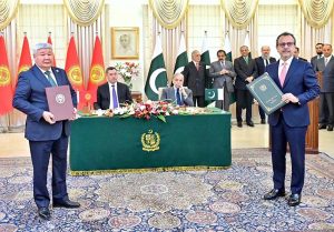 Pakistani Federal Minister exchange MoU with his Kyrgyz counterpart at the ceremony of exchange of MoUs between Pakistan and Kyrgyzstan in various sectors.