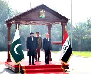 President Asif Ali Zardari and Dr. Abdul Latif Jamal Rashid, President of Iraq, at the guard of honour ceremony at Baghdad Palace.