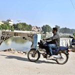 Damaged protective wall at Phuleli Canal bridge needs urgent attention from authorities to prevent accidents