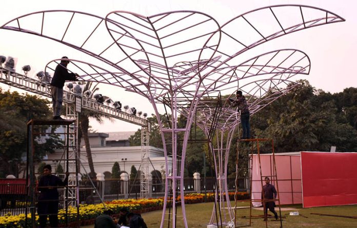 PHA staff busy in prepration and decorating the garden ahead of the upcoming Guldaudi exhibition