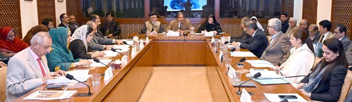 Senator Nasir Mahmood, Chairman of the Senate Standing Committee on Housing and Works, presides over a committee meeting at Parliament House