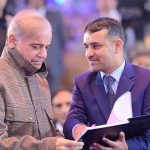 Prime Minister Muhammad Shehbaz Sharif interacts with students at the ceremony of distribution of laptops in the University of Azad Jammu and Kashmir.