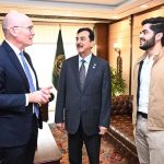 Chairman Senate Syed Yousaf Raza Gilani introduces his grandson, Mohammad Asfandyar Gilani, to Australian High Commissioner Mr. Timothy Kane at Parliament House