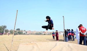 Athletes participate in a race during the Inter-Collegiate Girls’ Athletic Championship at the Education Board Ground