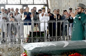 Senator Saleem Mandviwalla whip Senate offering Fateha after laying a floral wreath at mausoleum of Quaid-e-Azam Muhammad Ali Jinnah to pay homage to the father of the nation on the occasion of his 149th birth anniversary.