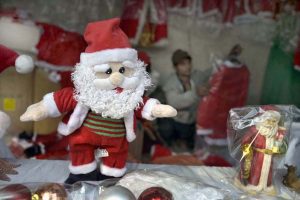 A vendor displays and sells Christmas-themed toys and accessories at a stall in the G-7 area of the Federal Capital.